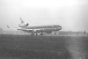 KLM MD11 landing on runway 06 'Kaagbaan' in the rain