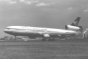 Mandarin Airlines MD11 taking off from runway 01L 'Zwanenburgbaan'